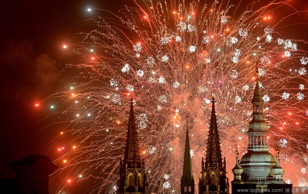Fireworks illuminate the sky above Prague