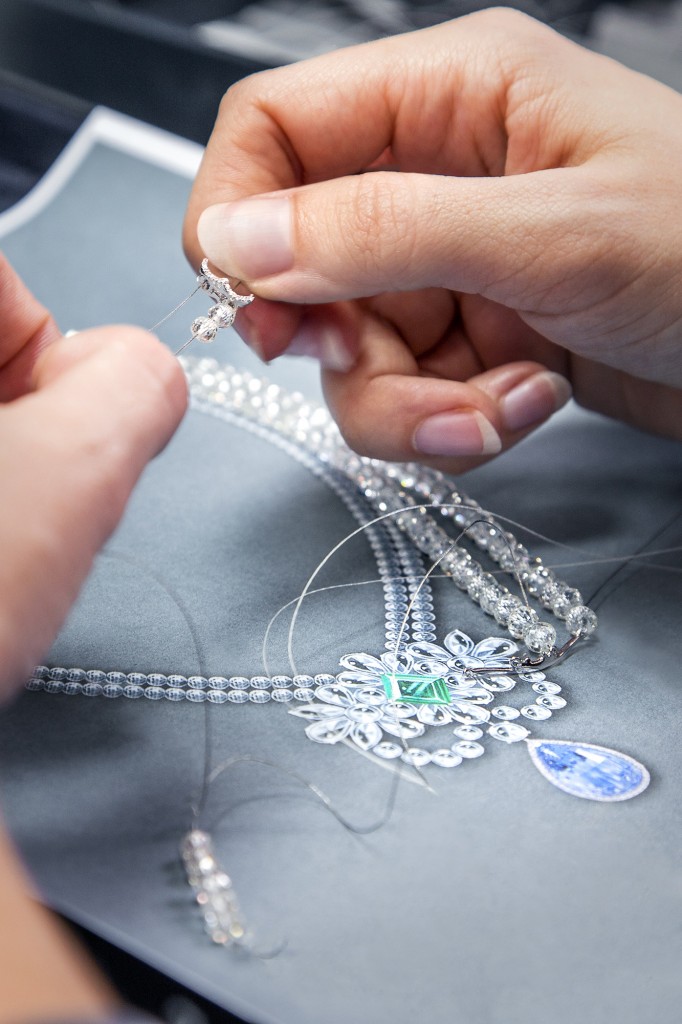 Delicate diamond beads are threaded to form the necklace of Le Collier Bleu de Reve